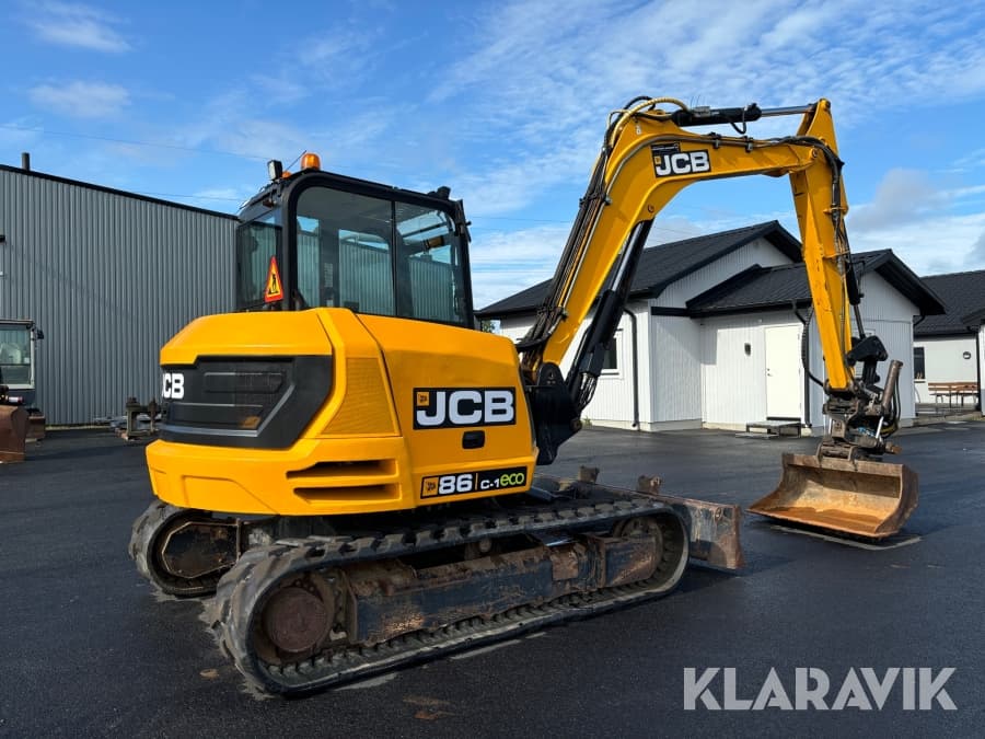 Gebrauchter JCB Bagger mit 6'488 Stunden, Vorderansicht